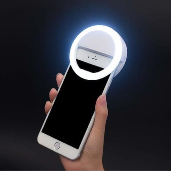 SELFIE RING LIGHT USED FOR APPLYING BRIGHT SHADE OVER FACE DURING TAKING SELFIES AND MAKING VIDEOS