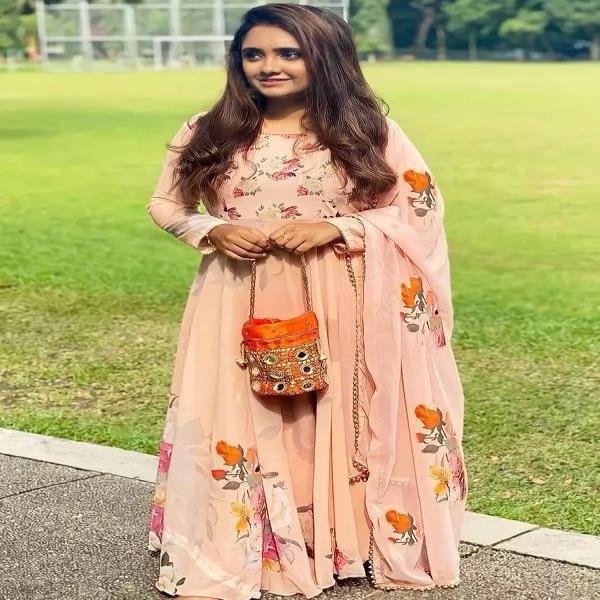 Featuring Solid georgette Anarkali Dress with finely Digital Printed Peral Less Dupatta  This is mad